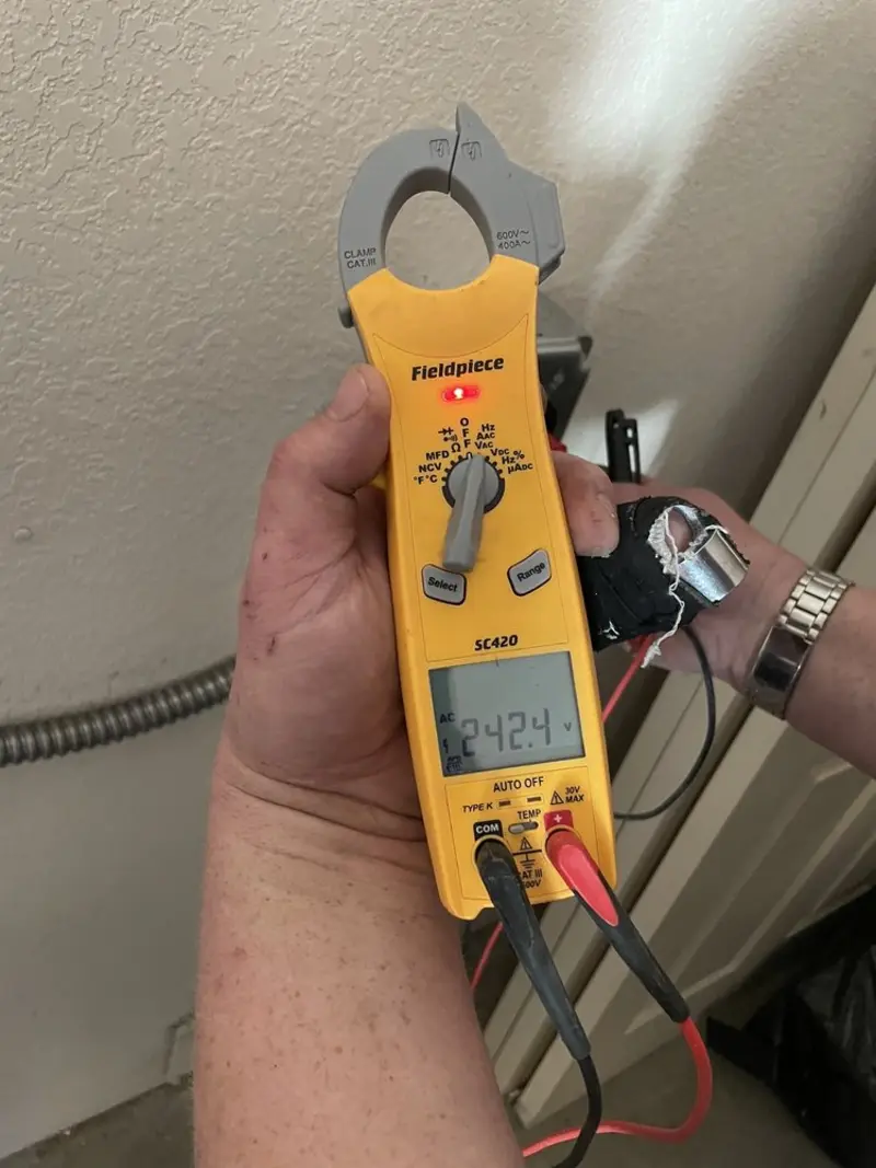 Voltage testing with clamp meter during Electrical Installation Services in Citrus Hills